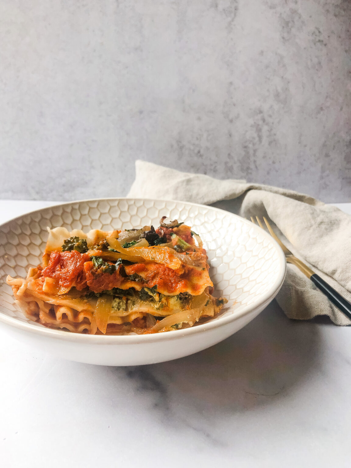 Dairy free lasagna with mushroom and kale, a gluten free vegan lasagna
