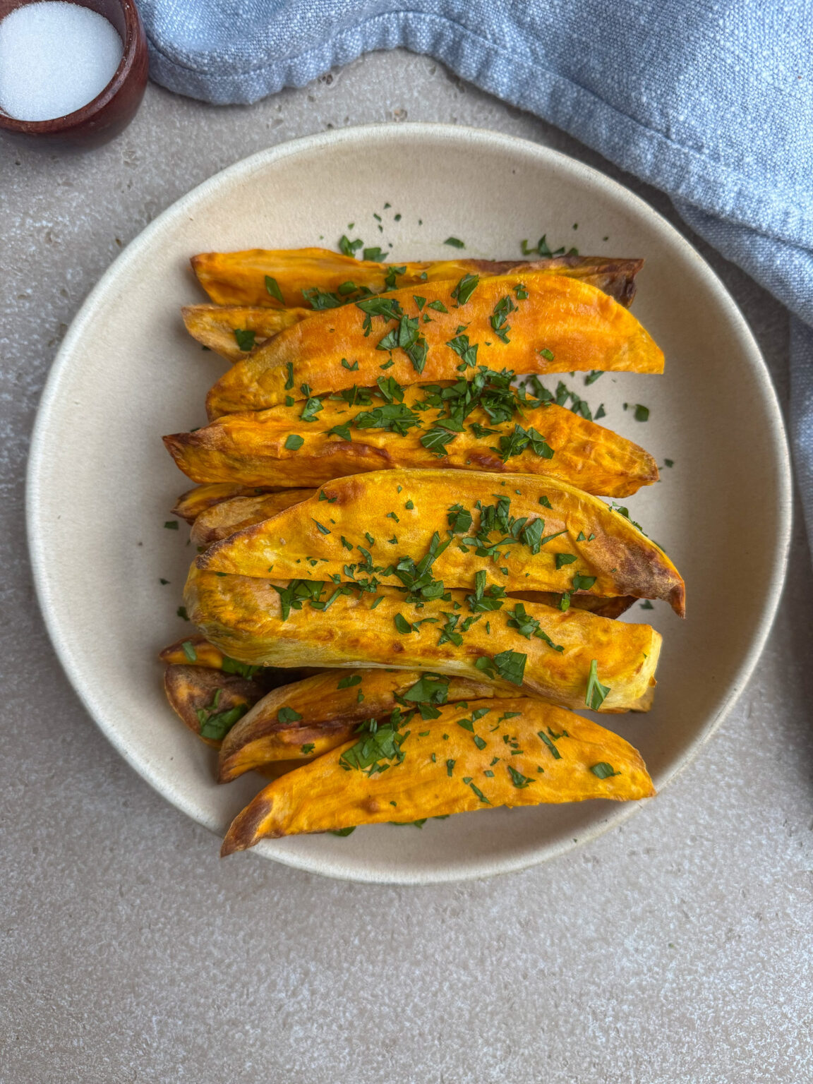 Air fryer sweet potato wedges with fresh herbs
