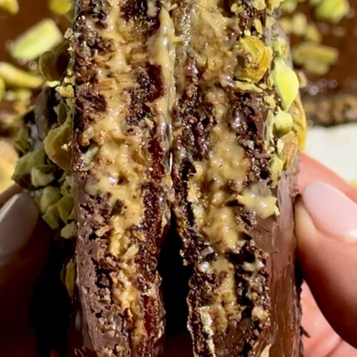 Dubai chocolate date bars with a creamy and crispy pistachio center.