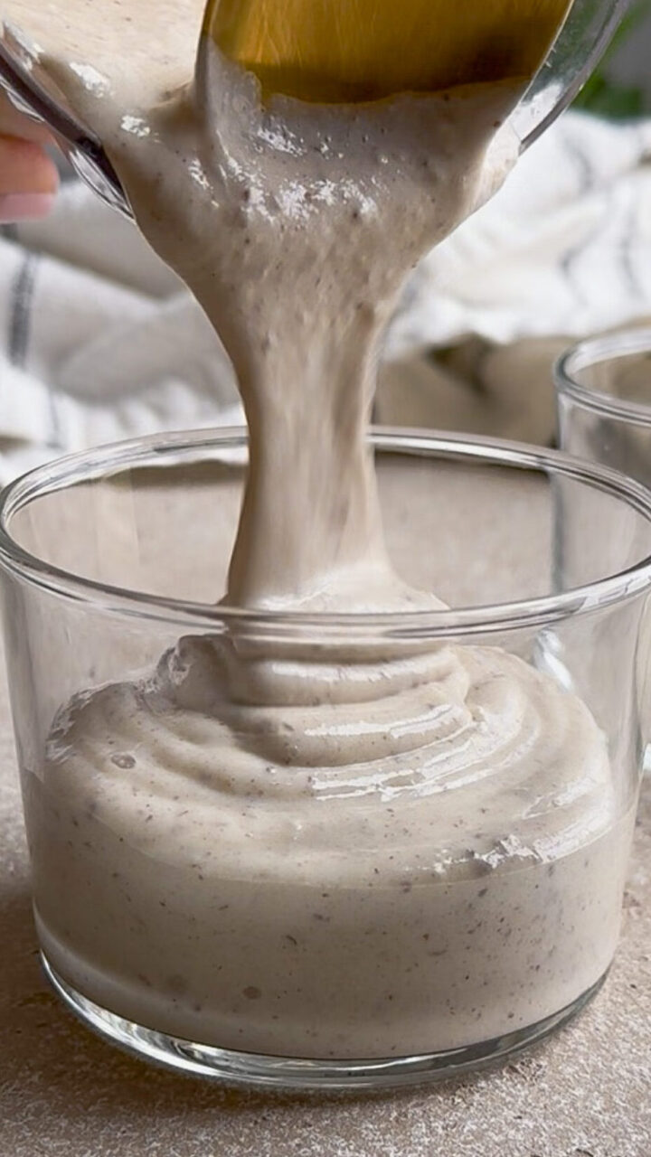 Pouring protein pudding into a glass container