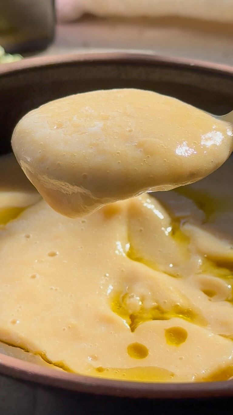 spoonful of white bean soup close up