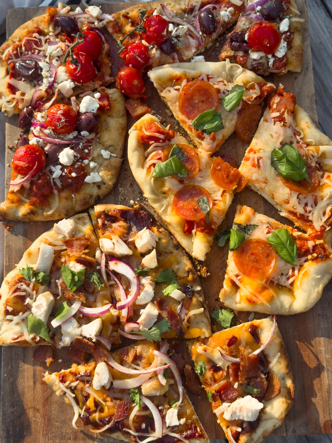 Campfire naan pizza 4 ways