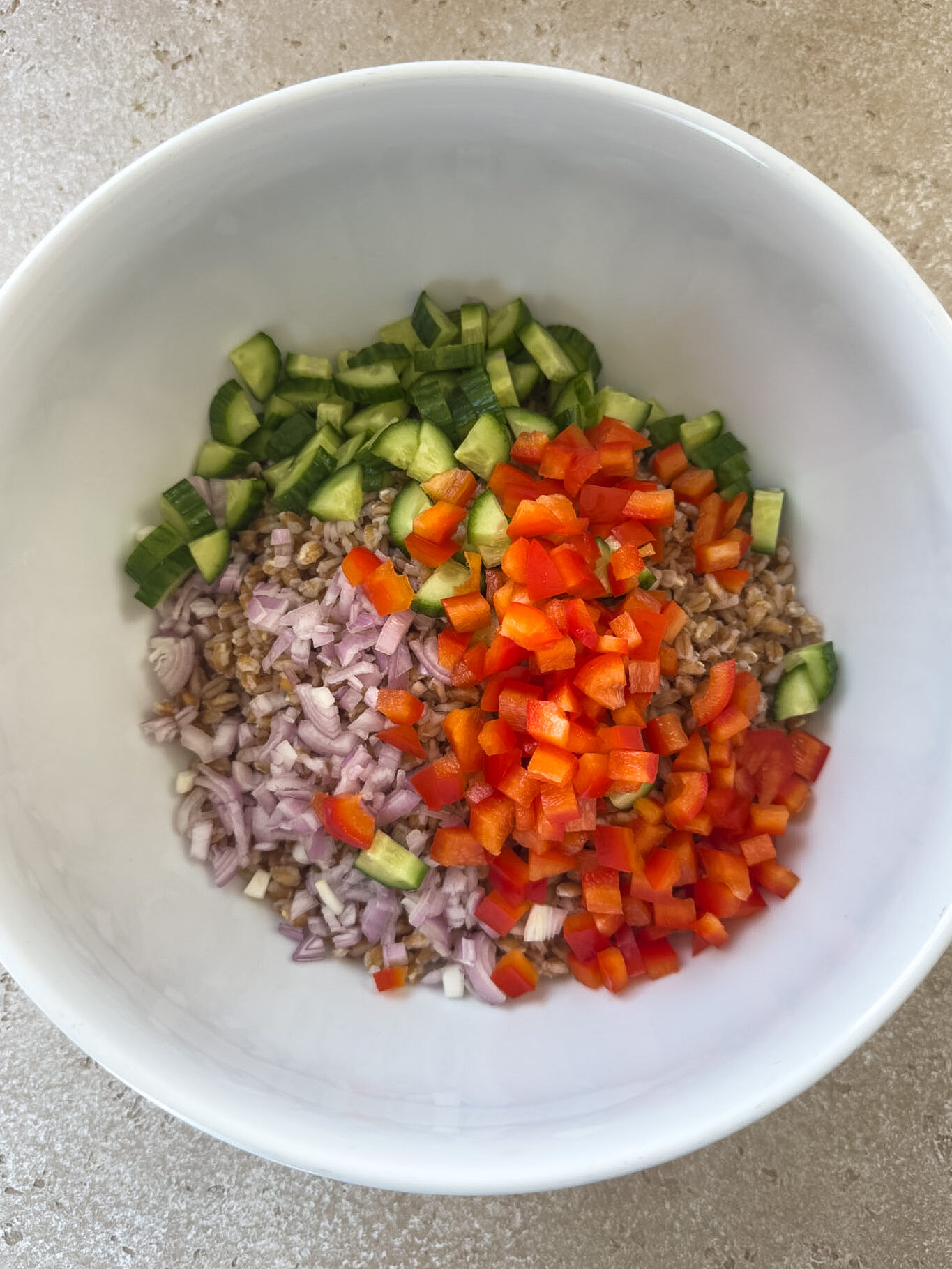 Farro, shallots, peppers and cucumbers for farro salad
