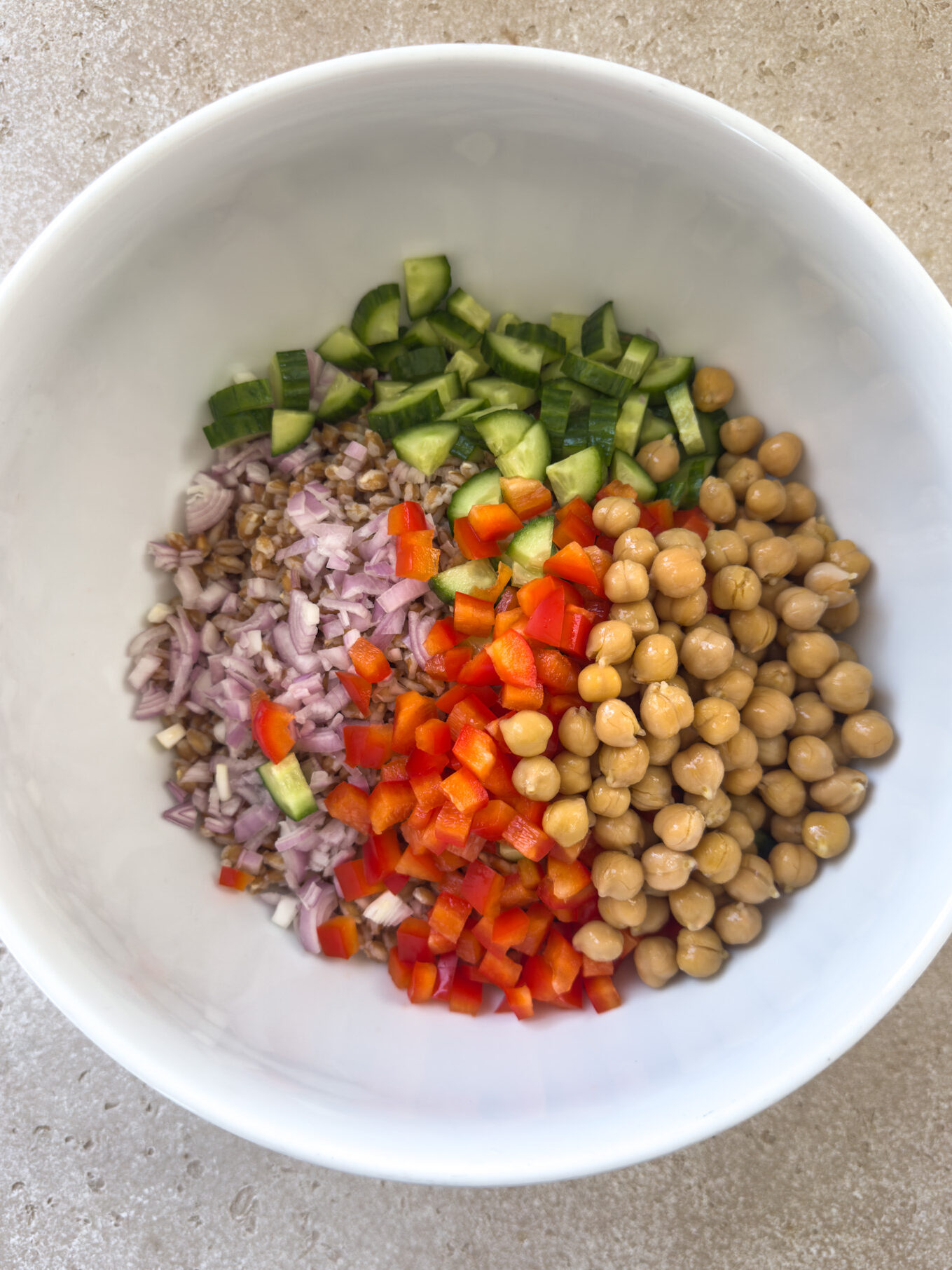 Farro, shallots, peppers, cucumbers and chickpeas for farro salad