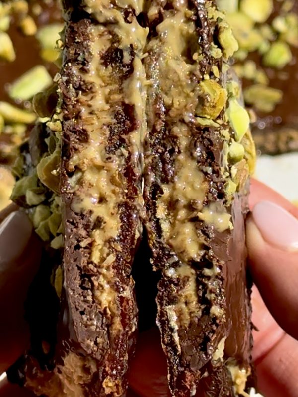 Dubai chocolate date bars with a creamy and crispy pistachio center.